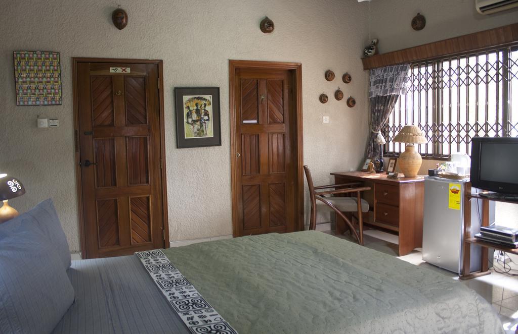 Four Villages Inn Kumasi Zimmer foto